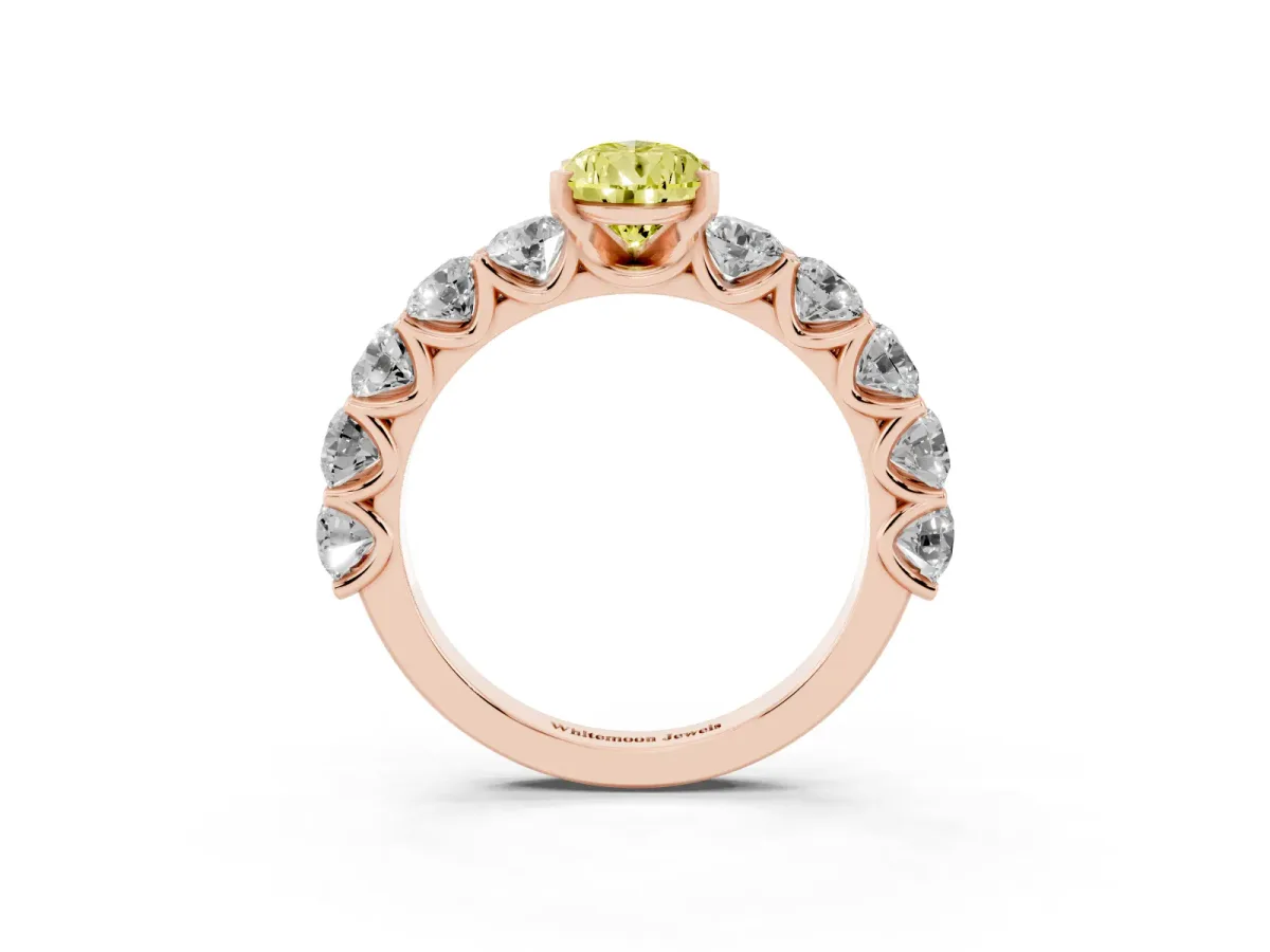 Fancy Yellow Pear Cut Diamond Prong Setting with Side Stones on a Pave Band Rose gold