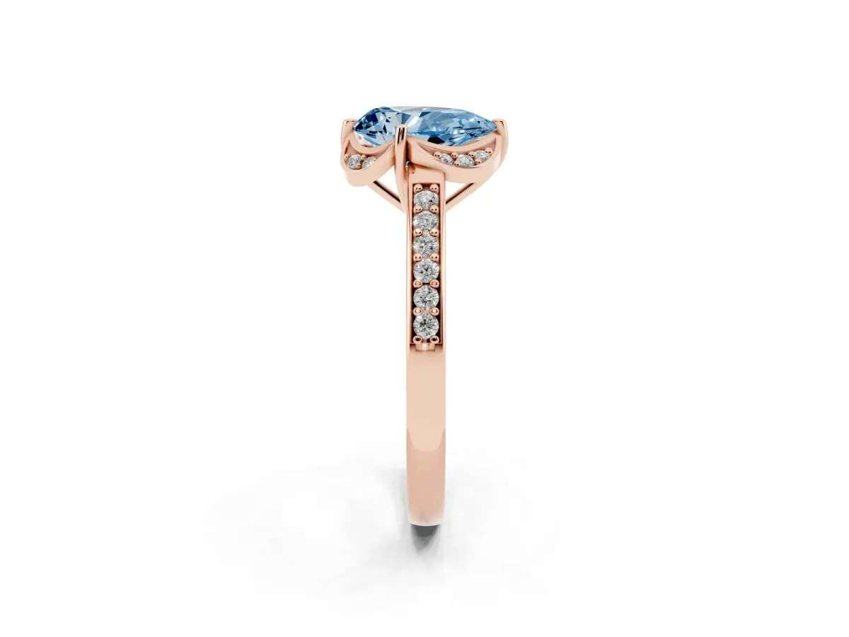 Fancy Blue Pear Cut Cut Halo Diamond Ring with Channel Set Band and Four-Prong Setting Rose gold