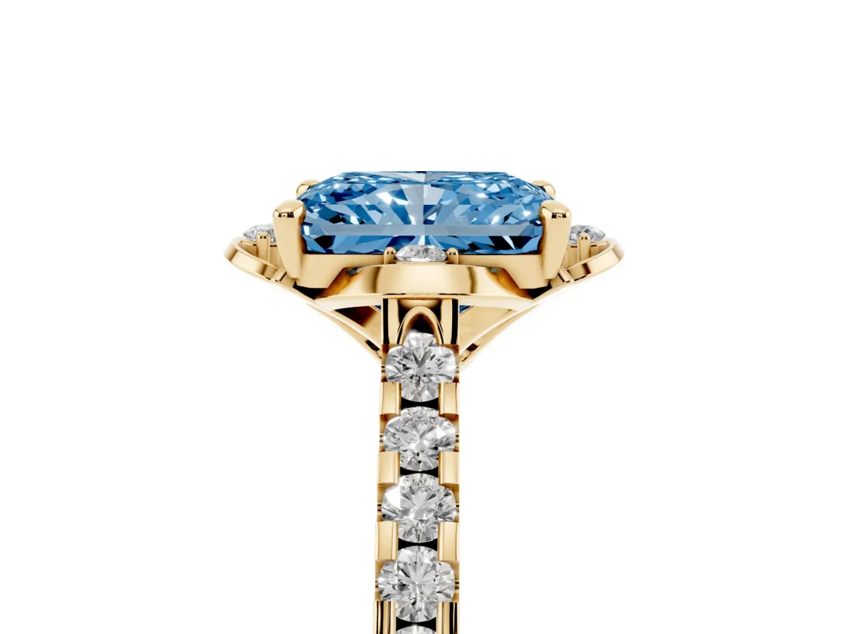 Fancy Blue Radiant Cut Diamond Ring with Pavé Band and Floral Prong Setting Yellow gold