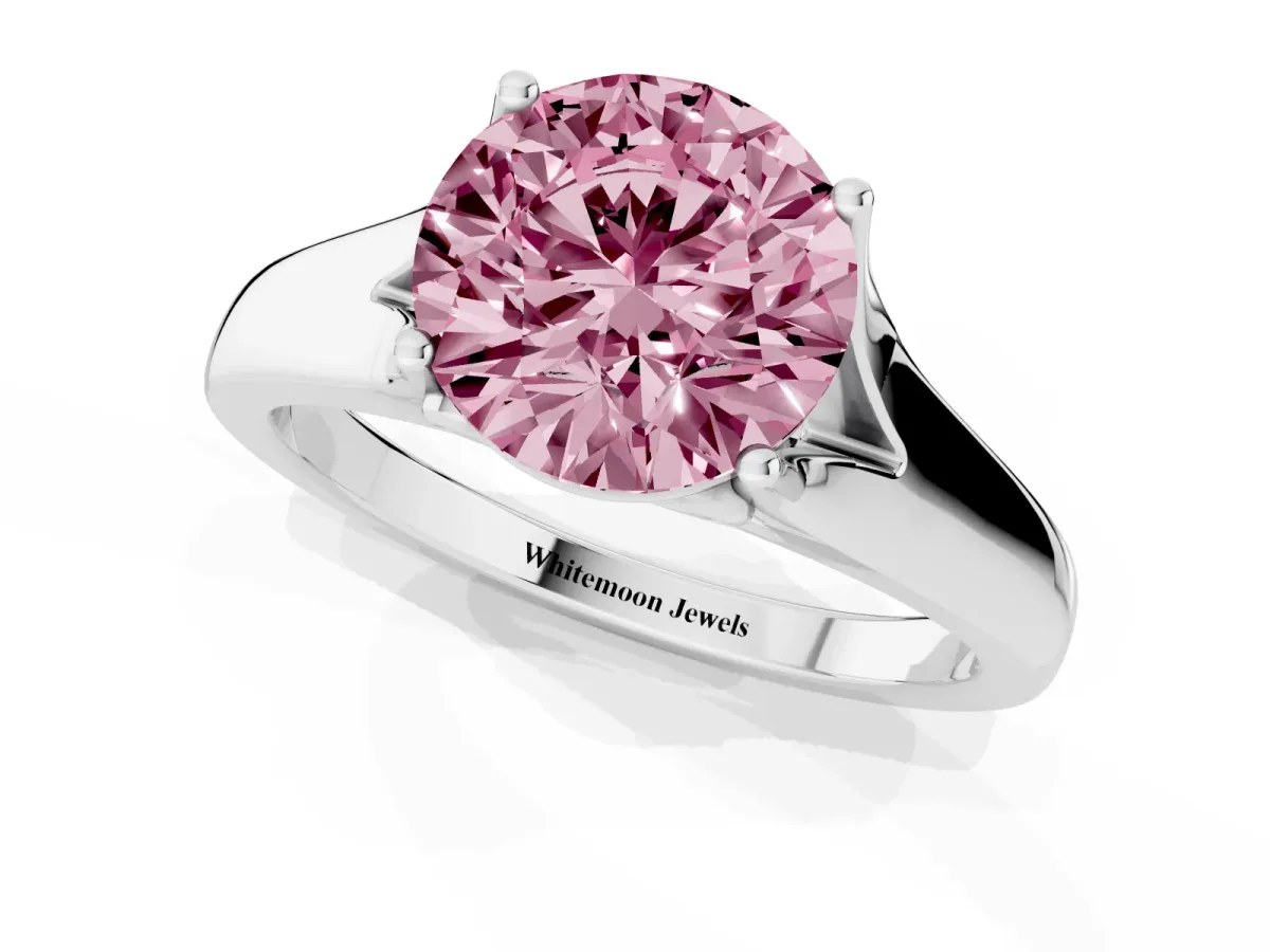 Fancy Pink Round Cut Solitaire Diamond Ring with Cathedral Band and Four-Prong Setting Silver