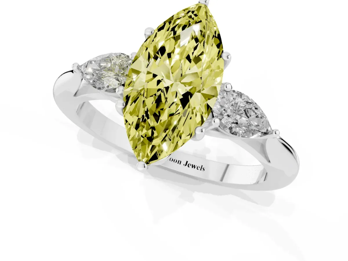Fancy Yellow Three-Stone Marquise Cut Diamond Ring with Pear Side Stones in Four-Prong Setting Silver