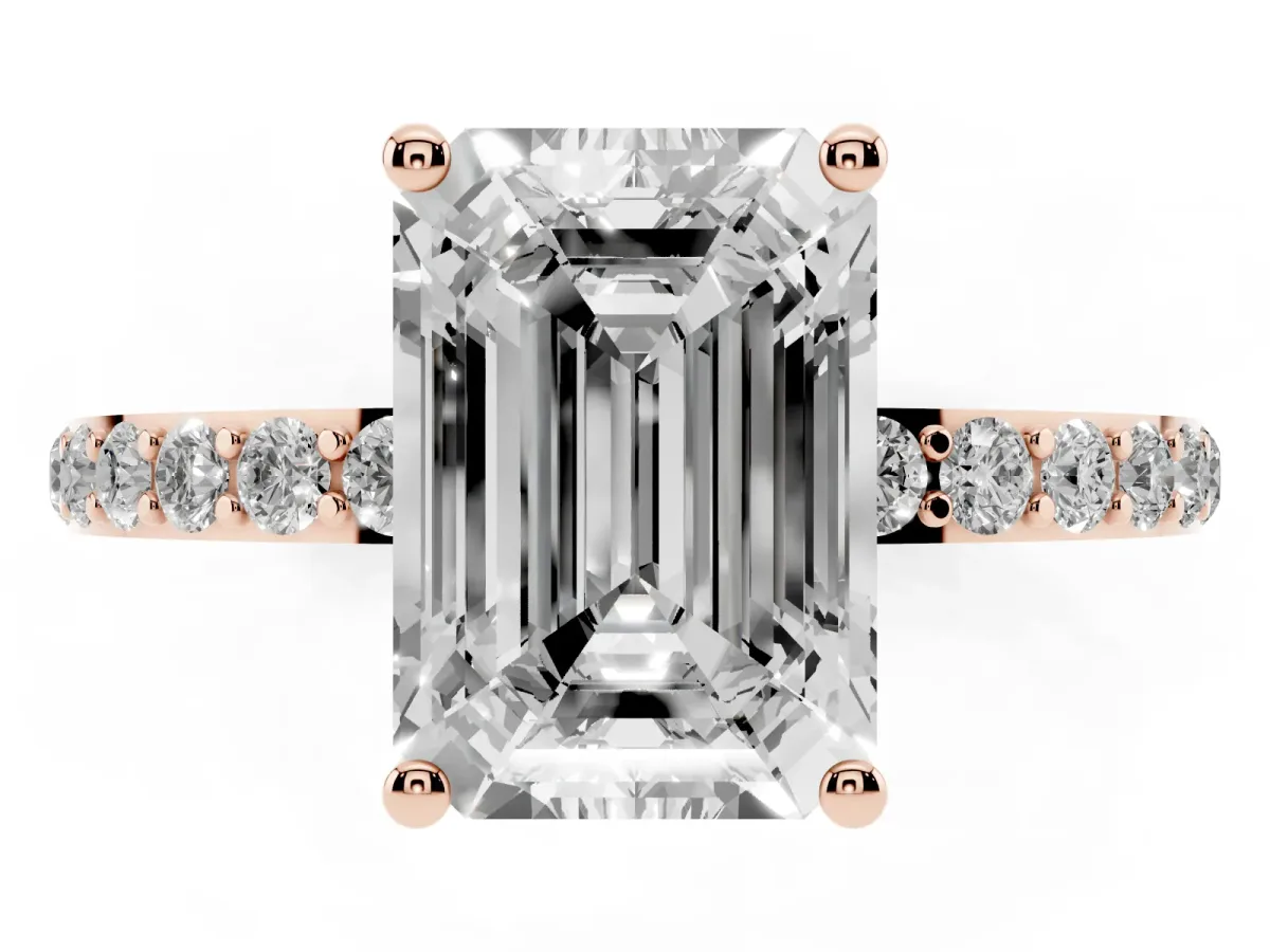 Emerald Cut Diamond Solitaire Ring with Round Pavé Shoulders and Prong Setting Rose gold