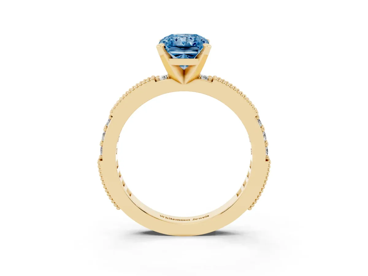 Fancy Blue Radiant Cut Solitaire with Pavé Band and Four-Prong Setting Yellow gold