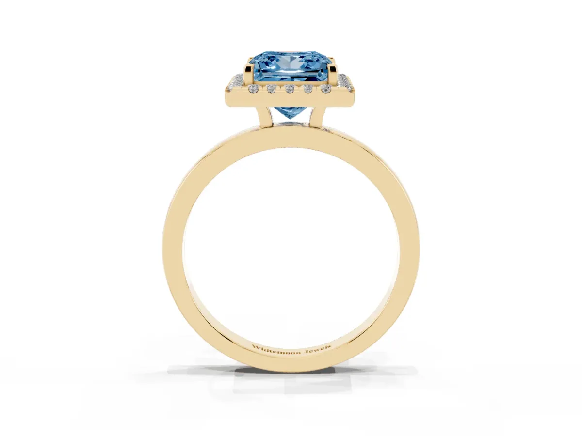 Fancy Blue Princess Cut Halo Diamond Solitaire with Pavé Band and Four-Prong Setting Yellow gold