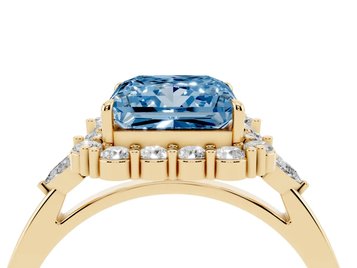 Fancy Blue Princess Cut Diamond Halo Ring with Pear Side Stones and Prong Setting Yellow gold