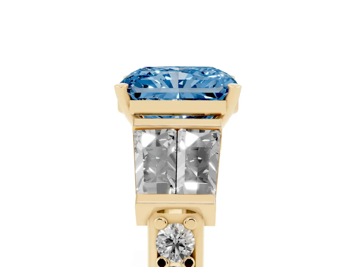 Fancy Blue Radiant Cut Diamond Engagement Ring with Baguette Side Stones and Channel Set Band Yellow gold