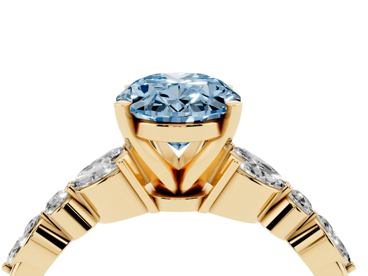 Fancy Blue Oval Cut Diamond Solitaire Ring with Side Stones and Four-Prong Setting Yellow gold