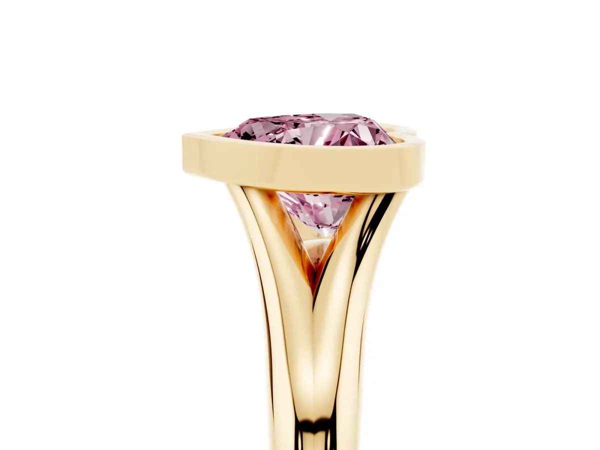 Fancy Pink Bezel Set Heart Cut Solitaire Diamond Ring with Smooth Band Yellow gold