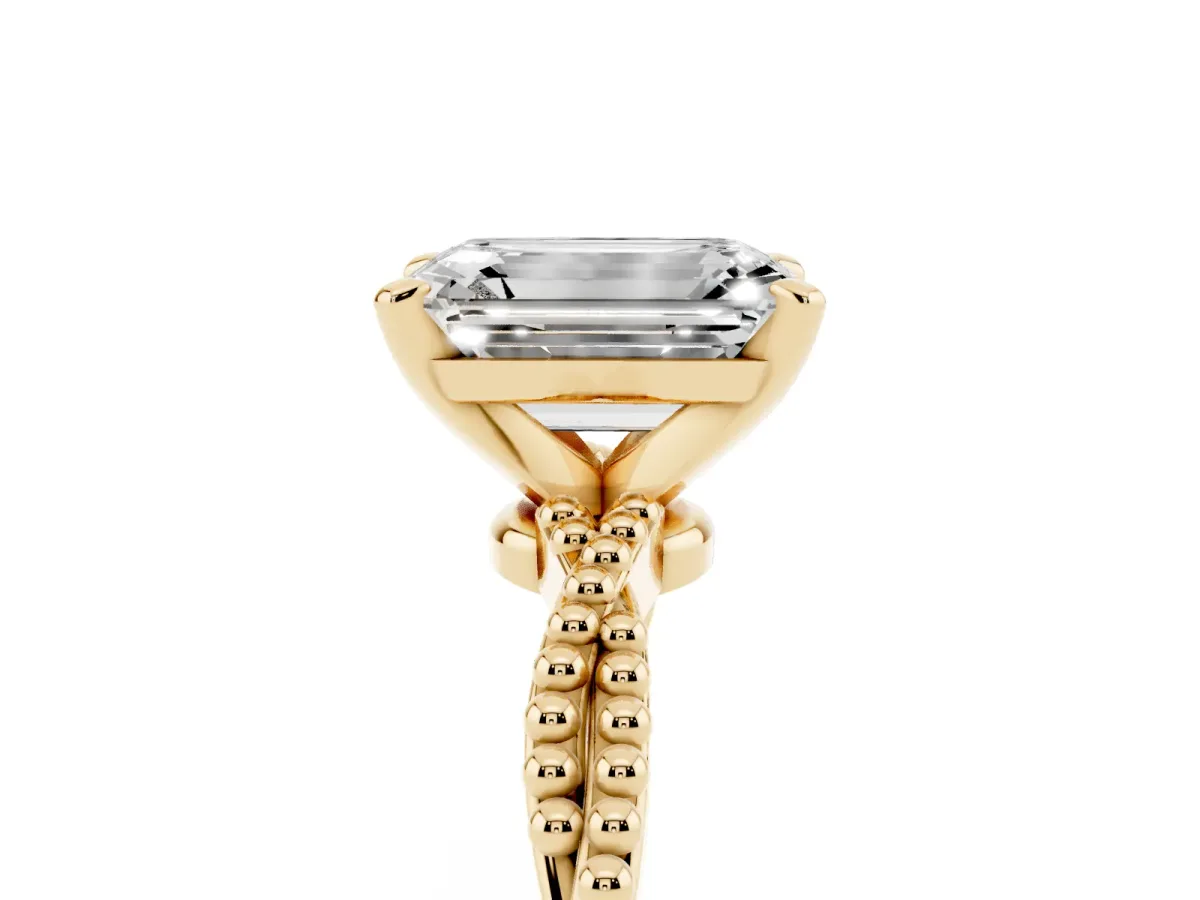 Emerald Cut Solitaire Twisted Band with Bead Prong Setting Yellow gold