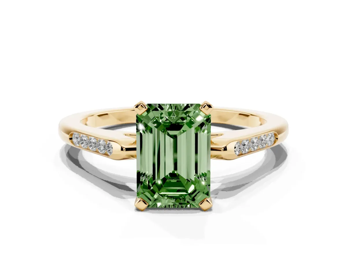 Fancy Green Emerald Cut Diamond Solitaire Ring with Channel Set Round Band and Prong Setting Yellow gold