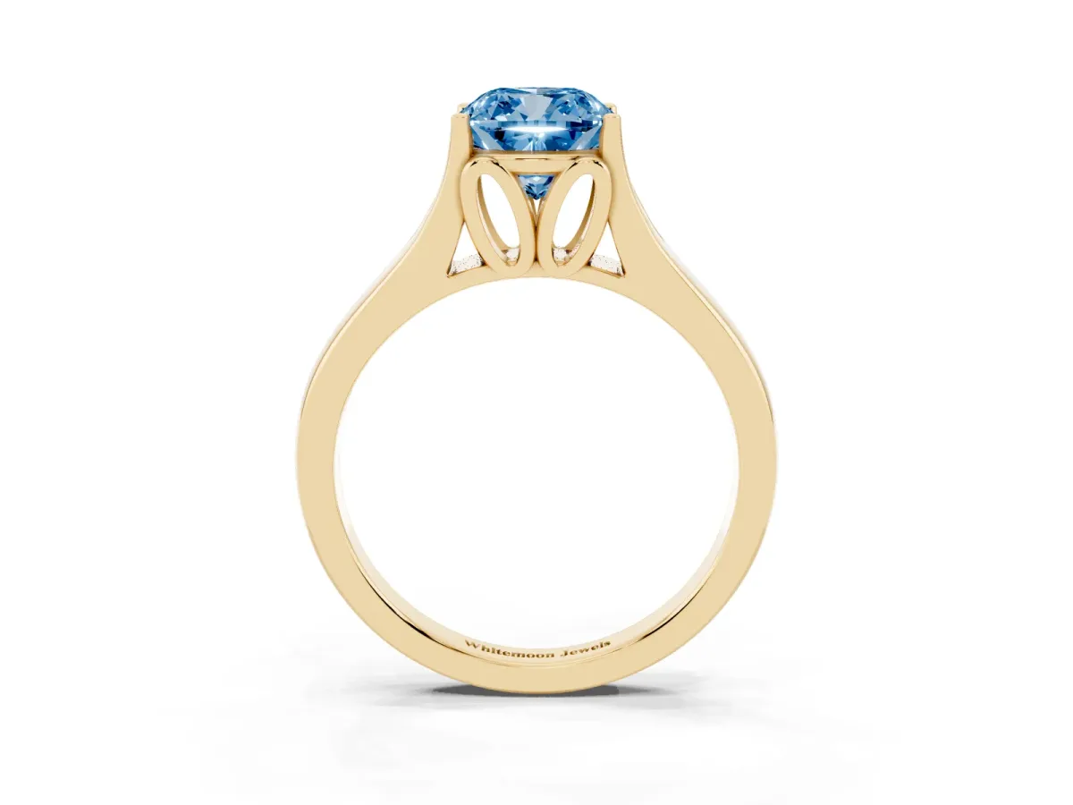 Fancy Blue Cushion Cut Solitaire Diamond Ring with Cathedral Band and Four-Prong Setting Yellow gold