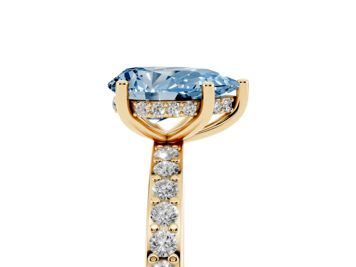 Fancy Blue Pear Cut Cut Diamond Pavé Band Ring with Four-Prong Setting Yellow gold