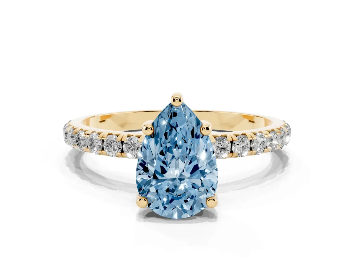 Fancy Blue Pear Cut Cut Diamond Solitaire Ring with Micro Pave Band and Four Prong Setting Yellow gold