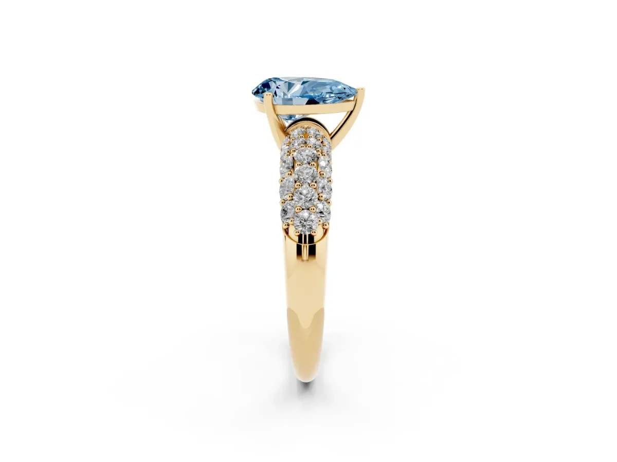 Fancy Blue Pear Cut Diamond Pavé Band Solitaire Ring with Four-Prong Setting Yellow gold