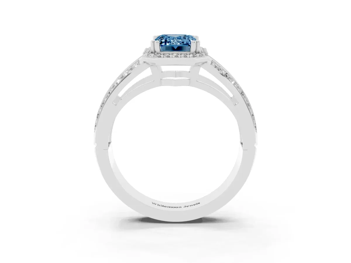 Fancy Blue Emerald Cut Diamond Halo Ring with Split Shank Pavé Band and Four-Prong Setting White gold