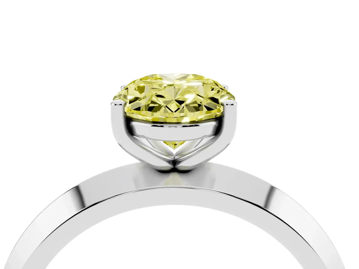 Fancy Yellow Oval Cut Cut Solitaire Engagement Ring with Flat Band and Four-Prong Setting Silver