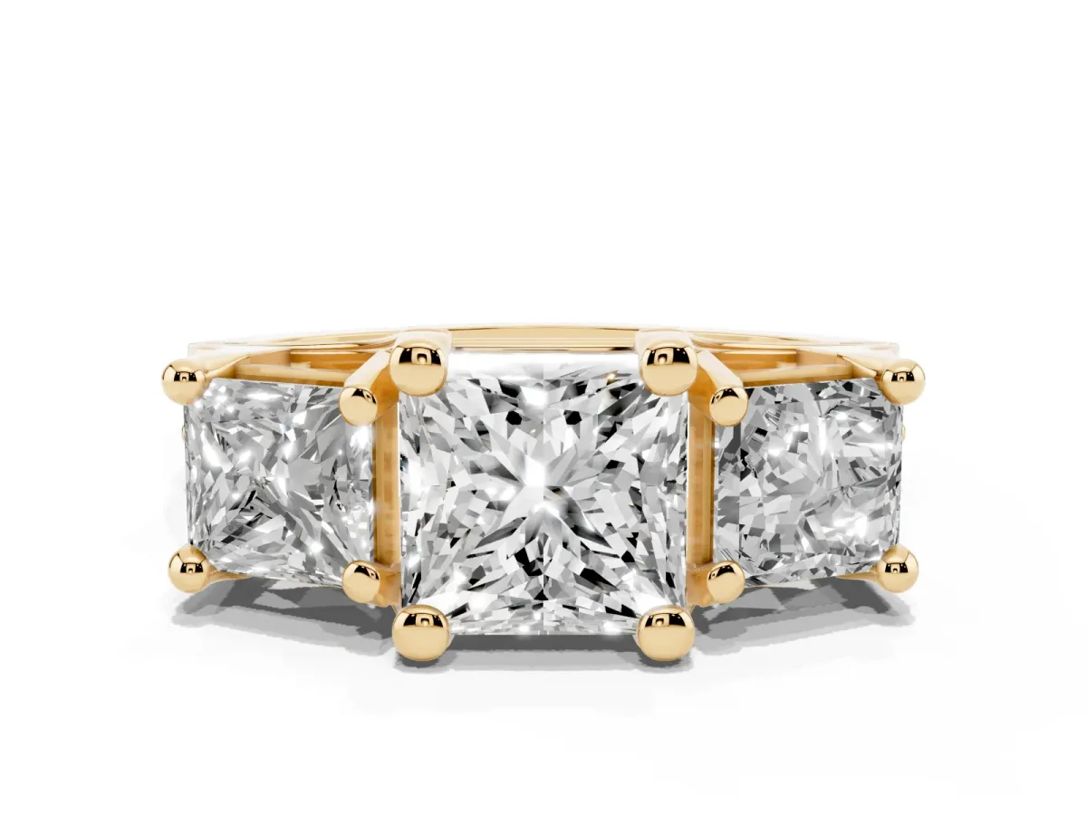 Princess Cut Diamond Three-Stone Ring with Channel Set Band and Four-Prong Setting Yellow gold