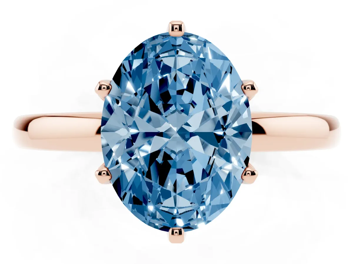 Fancy Blue Oval Cut Solitaire Diamond Ring with Six-Prong Setting on a Classic Band Rose gold