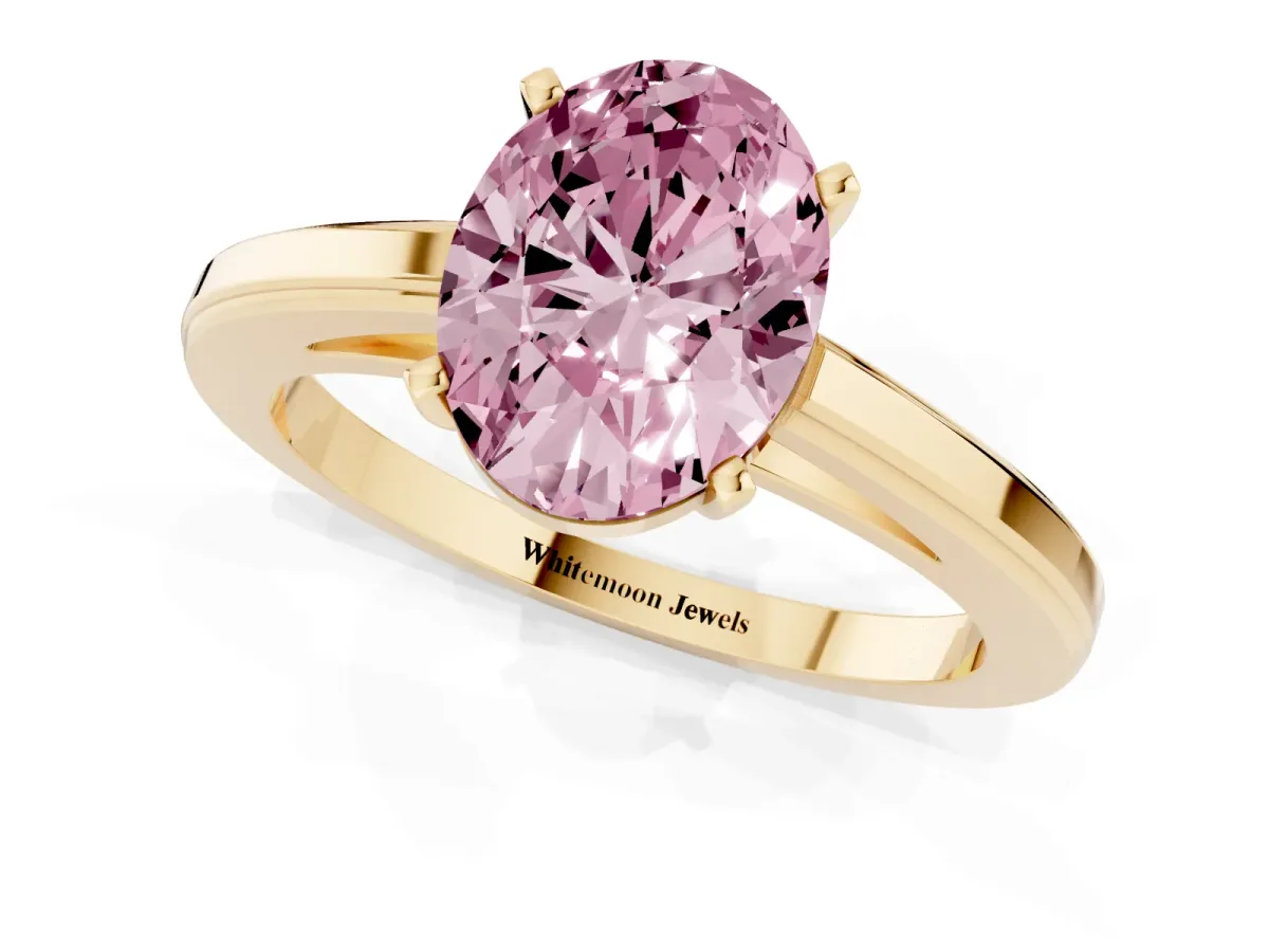 Fancy Pink Oval Cut Solitaire Diamond Ring with Four-Prong Setting and Classic Band Yellow gold