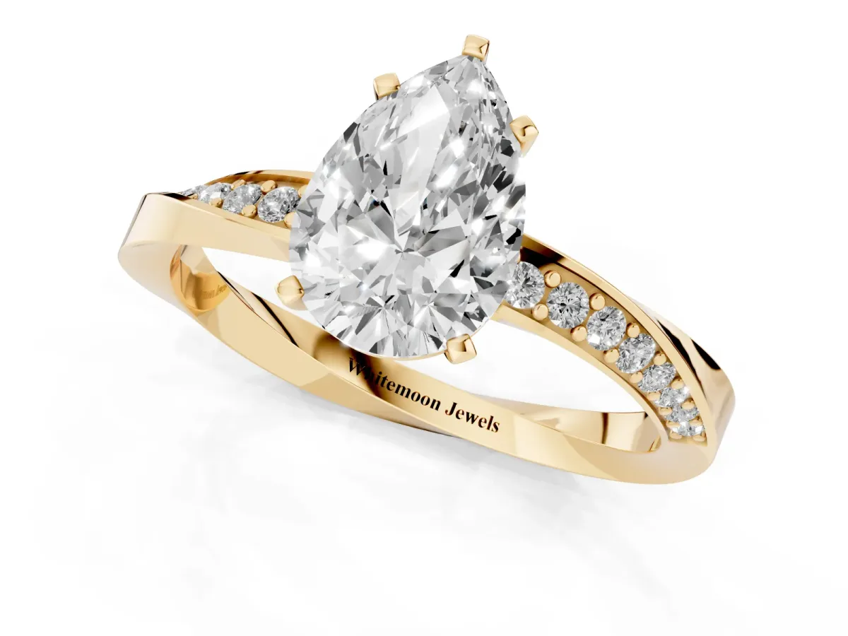 Pear Cut Diamond Engagement Ring with Side Stone Accents and Four-Prong Setting Yellow gold