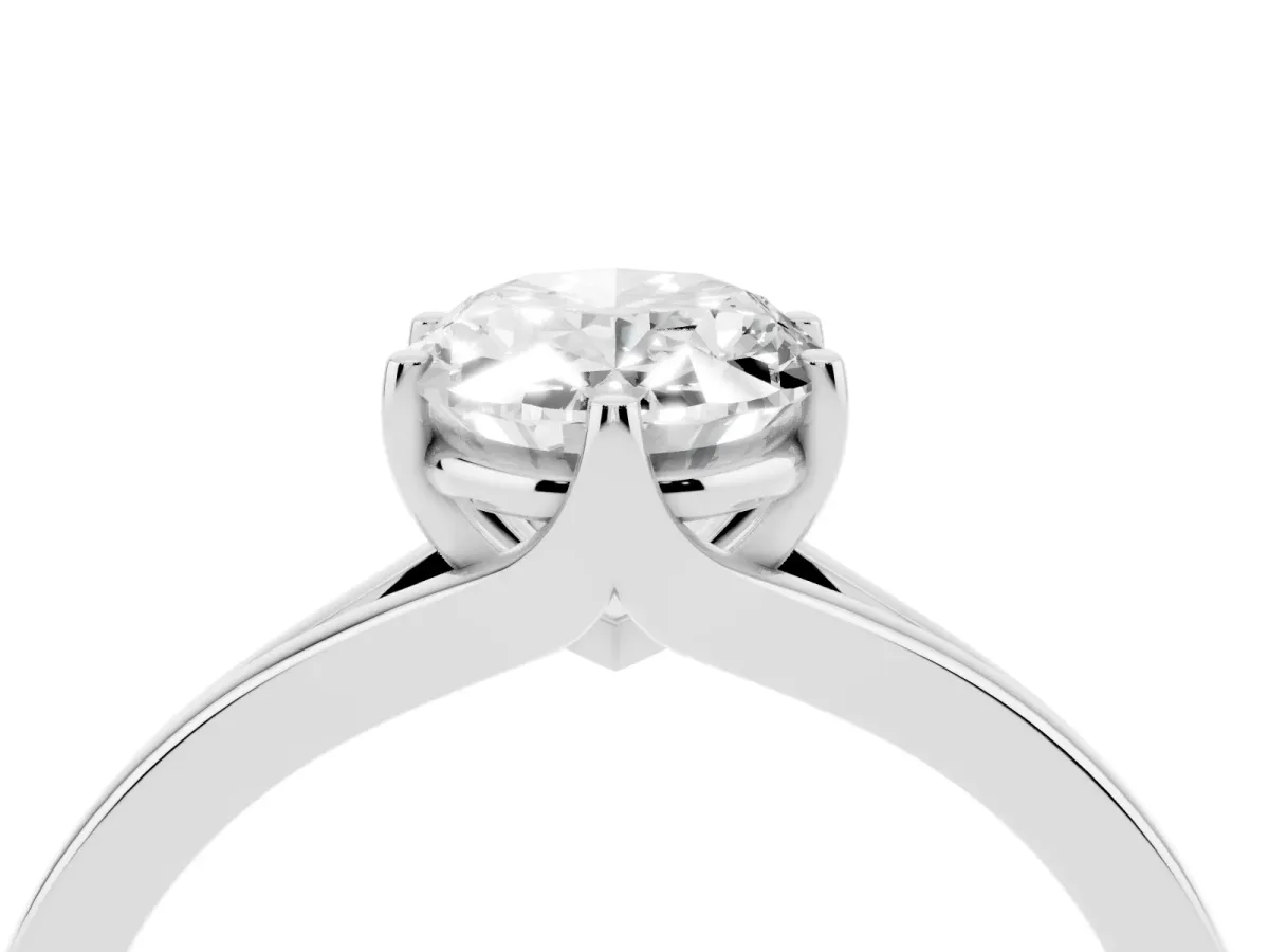 Oval Cut Solitaire Diamond Ring with Six-Prong Setting and Tapered Band Platinum