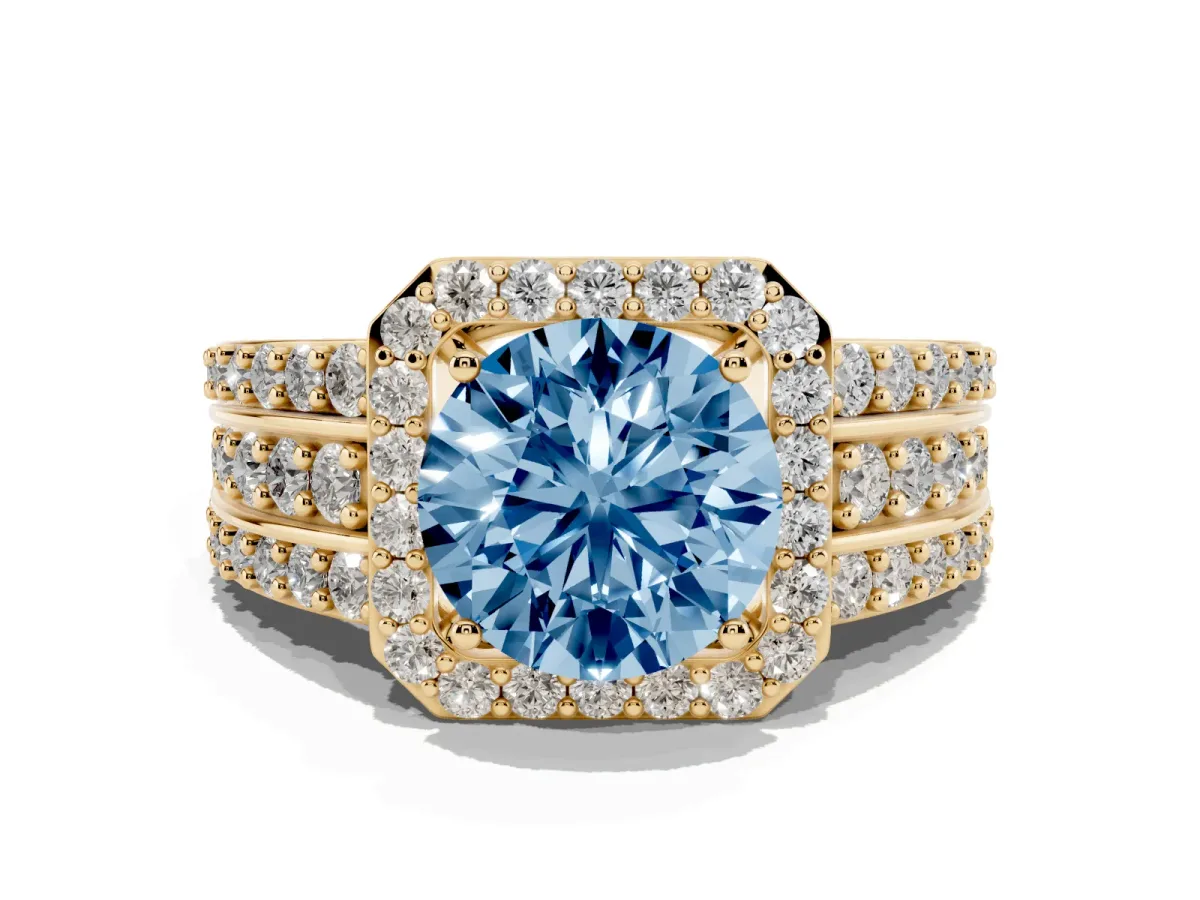 Fancy Blue Round Cut Halo Diamond Ring with Round Split Shank and Prong Setting Yellow gold