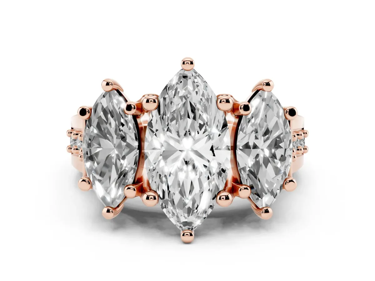 Marquise Cut Diamond Three-Stone Ring with Channel Set Band and Four-Prong Setting Rose gold
