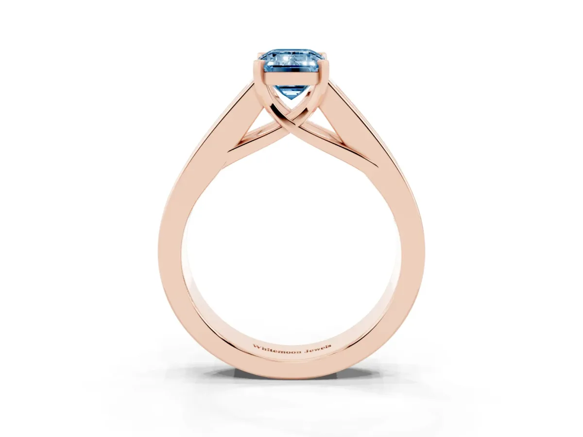 Fancy Blue Emerald Cut Cut Channel Set Solitaire Ring with Four-Prong Setting Rose gold