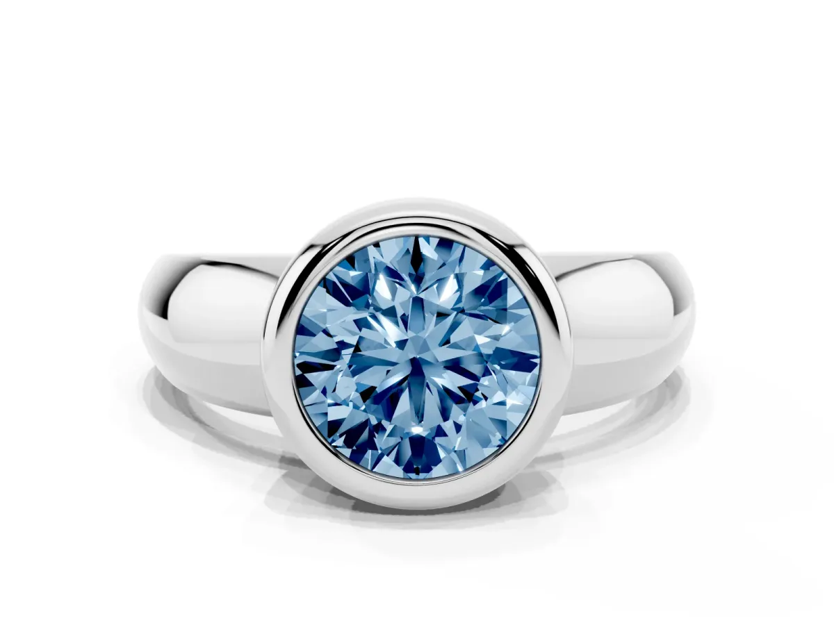 Fancy Blue Bezel Set Round Cut Solitaire Ring with Wide Band Platinum