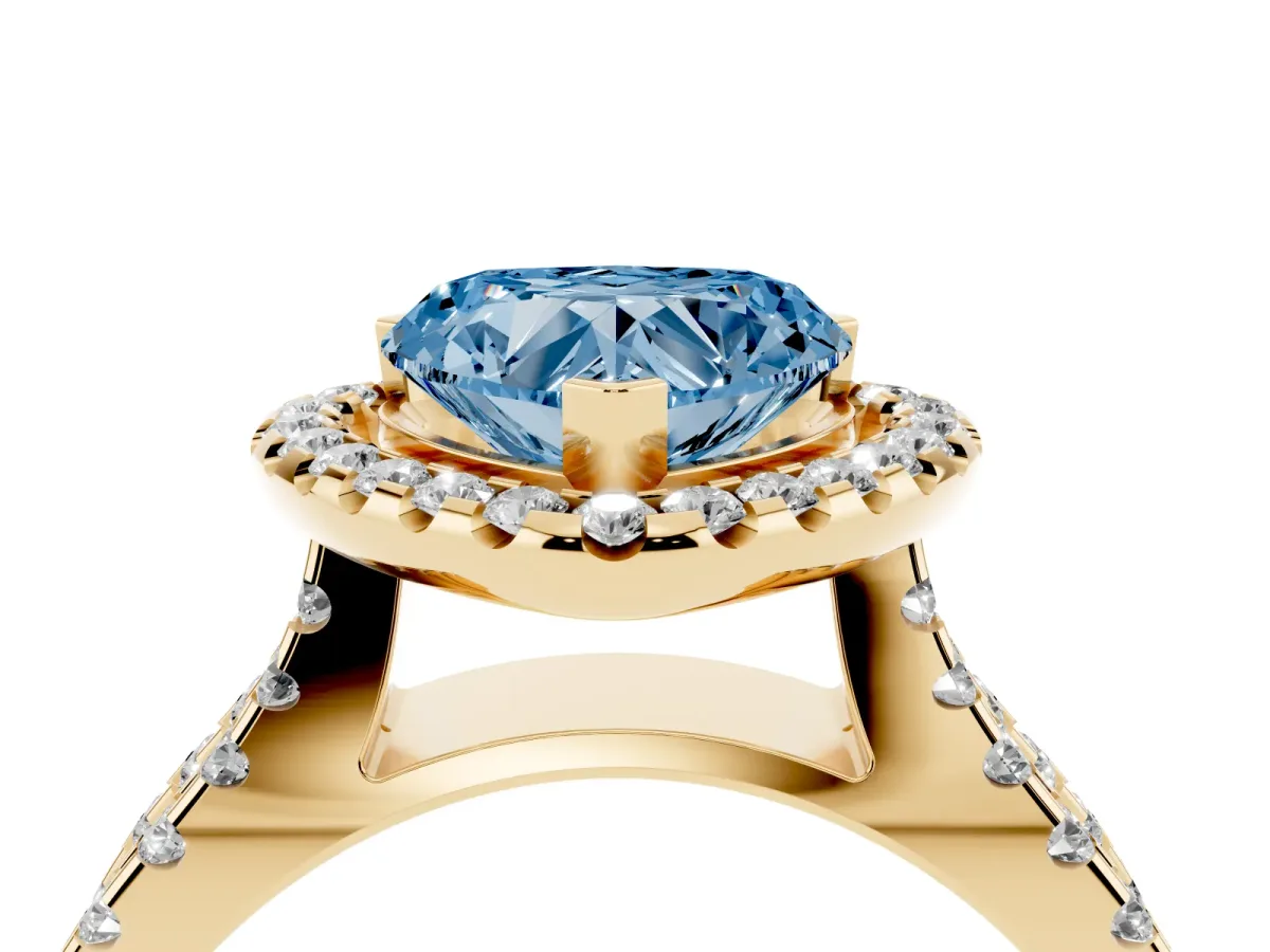 Fancy Blue Heart Cut Diamond Halo Ring with Split Shank Pavé Band and Prong Setting Yellow gold