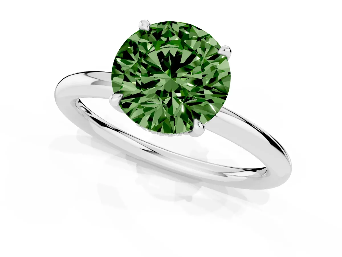 Fancy Green Round Cut Diamond Solitaire Ring with Thin Band and Four-Prong Setting Silver