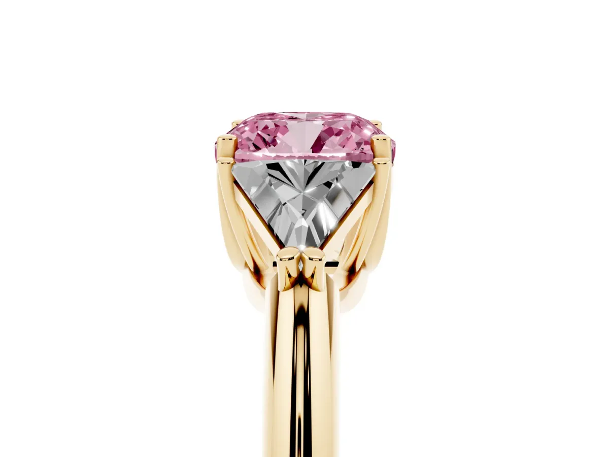 Fancy Pink Three-Stone Cushion Cut Diamond Engagement Ring with Trillion Side Stones and Prong Setting Yellow gold