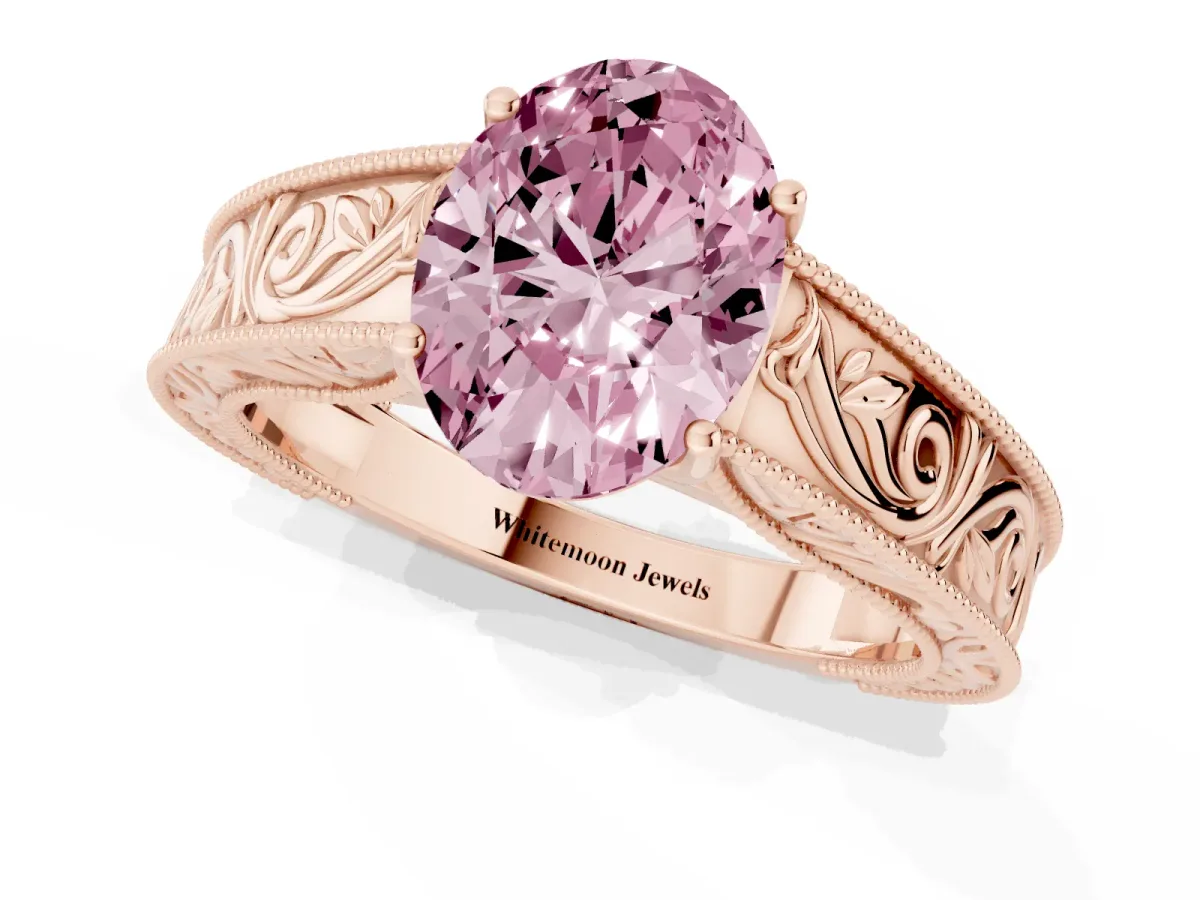 Fancy Pink Oval Cut Diamond Solitaire Ring with Engraved Band and Four-Prong Setting Rose gold