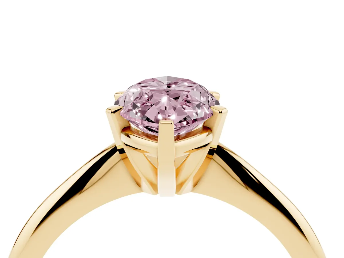 Fancy Pink Marquise Cut Cut Solitaire Ring with Four-Prong Setting on a Classic Band Yellow gold