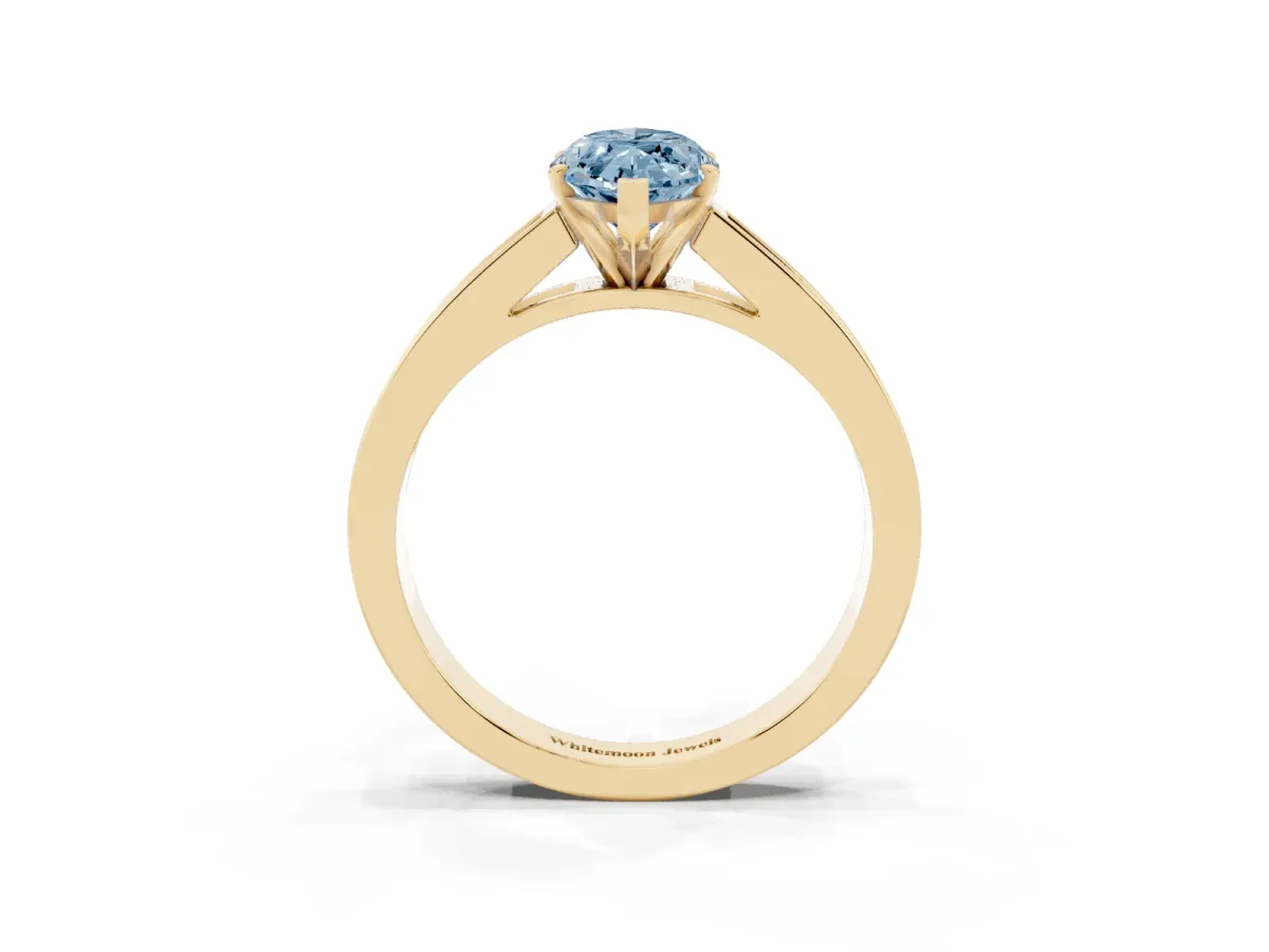 Fancy Blue Marquise Cut Solitaire Diamond Ring with Channel-Set Band and Four-Prong Setting Yellow gold