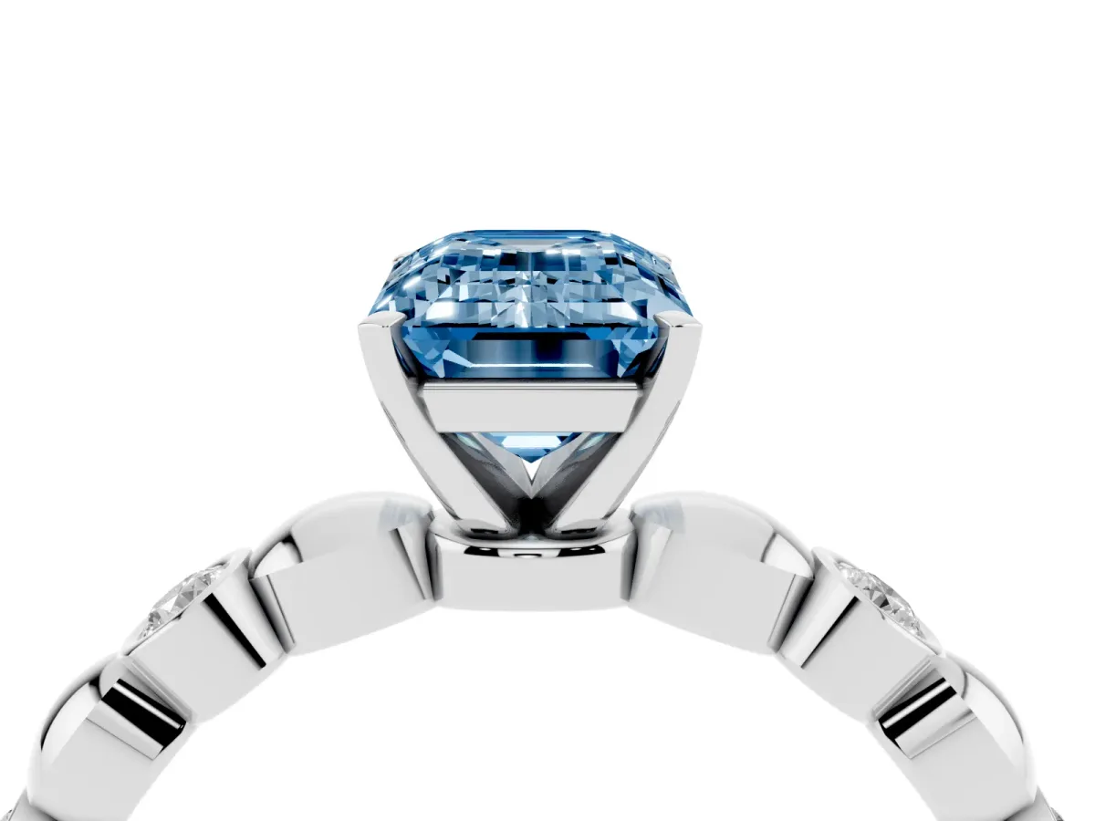 Fancy Blue Emerald Cut Solitaire Bezel-Set Diamond Ring with Beaded Band and Four-Prong Setting Silver