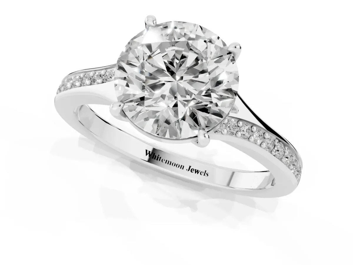 Round Cut Diamond Solitaire Ring with Pavé Band and Prong Setting Platinum