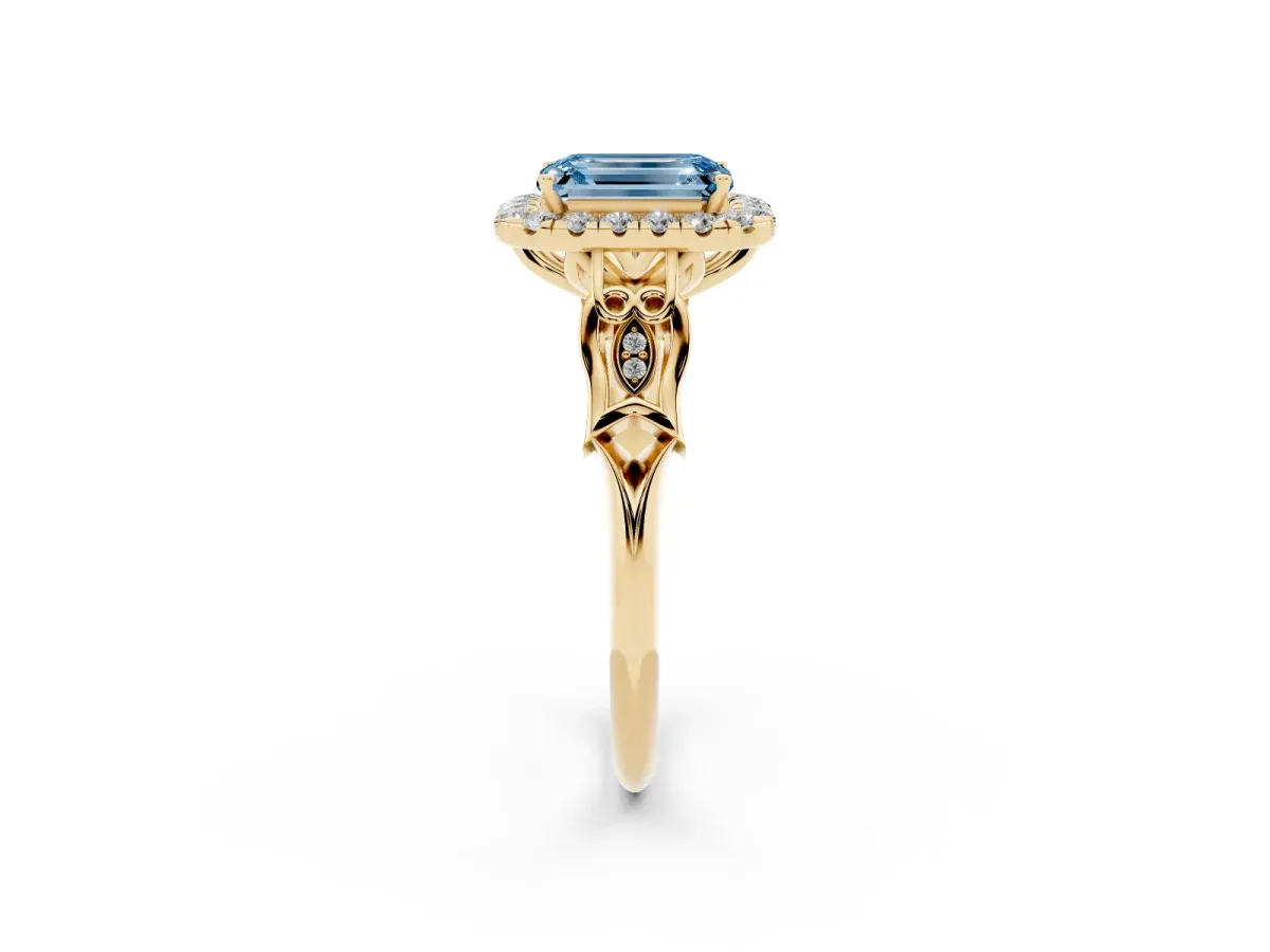 Fancy Blue Emerald Cut Halo Diamond Engagement Ring with Filigree Band and Four-Prong Setting Yellow gold