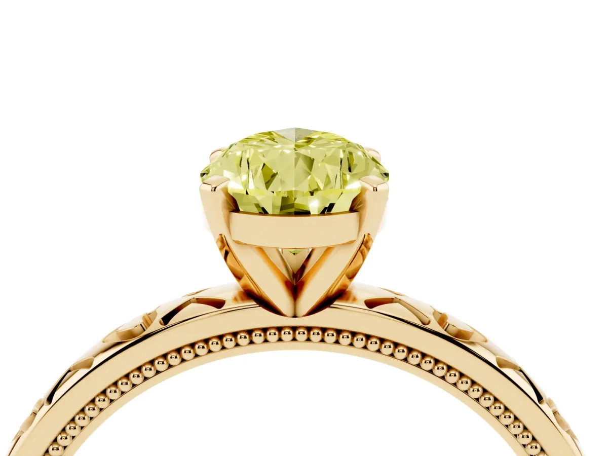 Fancy Yellow Pear Cut Solitaire Diamond Engagement Ring with XO Engraved Band and Four-Prong Setting Yellow gold