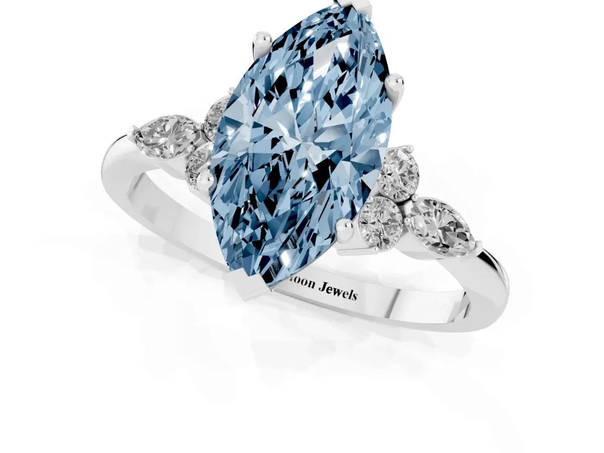 Fancy Blue Marquise Cut Brilliant Diamond Solitaire Ring with Pear Side Stones and Four-Prong Setting Silver