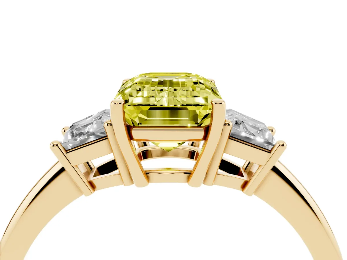 Fancy Yellow Emerald Cut Diamond Three-Stone Ring with Trapezoid Side Stones and Prong Setting Yellow gold