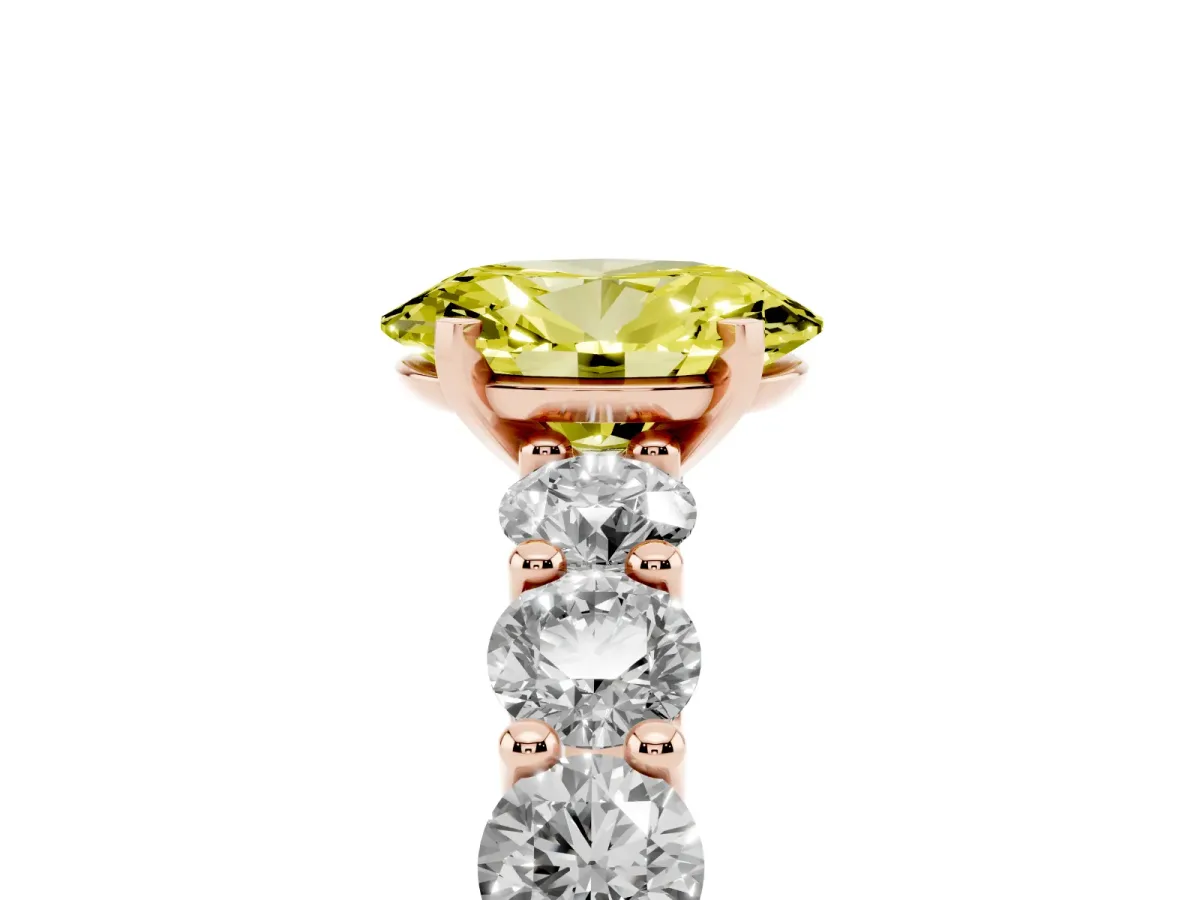 Fancy Yellow Oval Cut Diamond Prong Setting with Side Stones on a Pave Band Rose gold