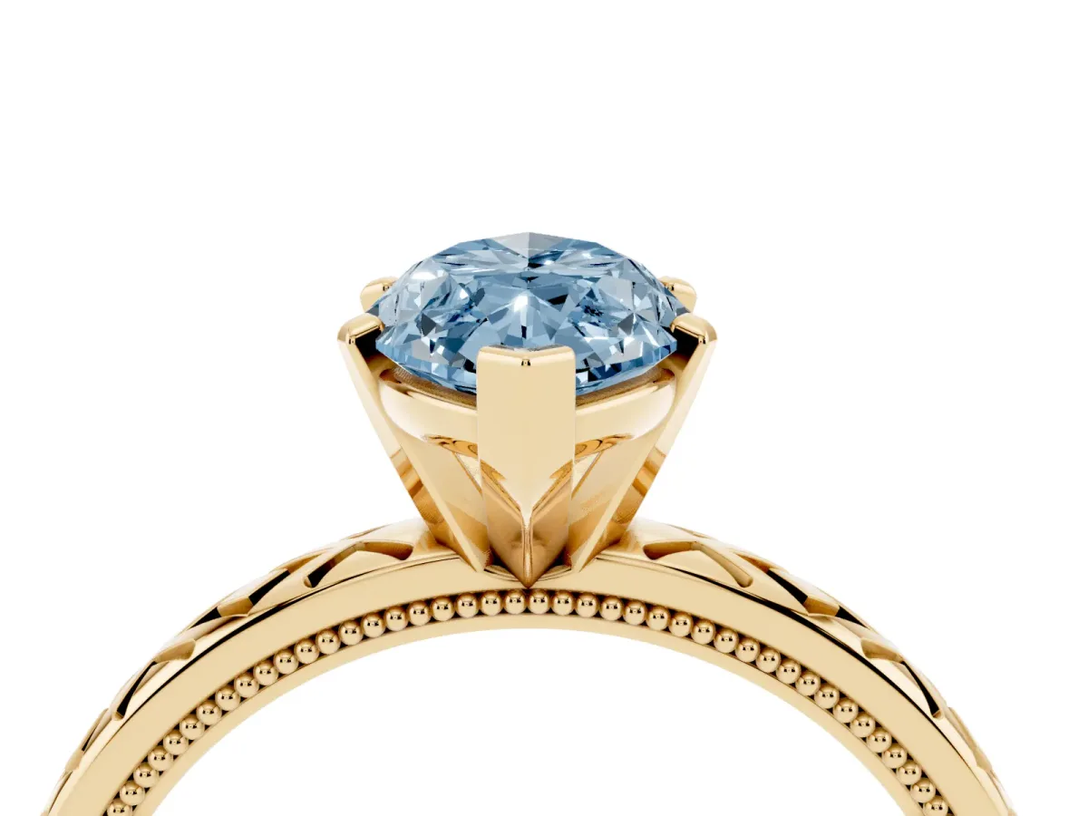 Fancy Blue Marquise Cut Solitaire Diamond Ring with Milgrain and Black Enamel X Pattern Band Yellow gold