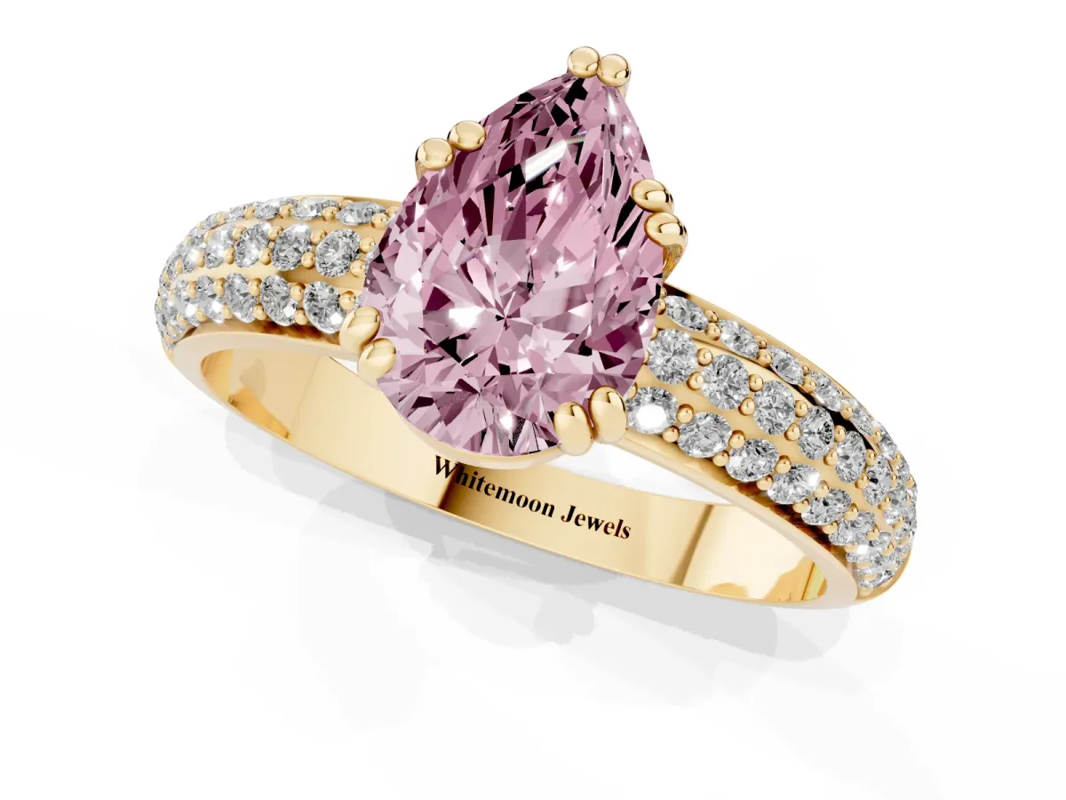 Fancy Pink Pear Cut Diamond Solitaire Ring with Multi-Row Round Pavé Band and Prong Setting Yellow gold