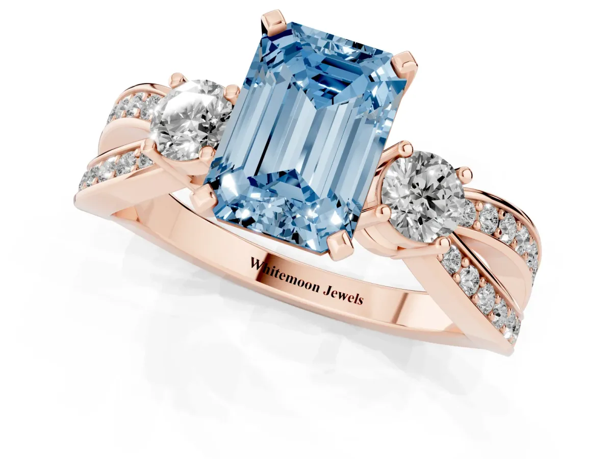 Fancy Blue Three-Stone Emerald Cut Cut Diamond Twist Band with Prong Setting Rose gold