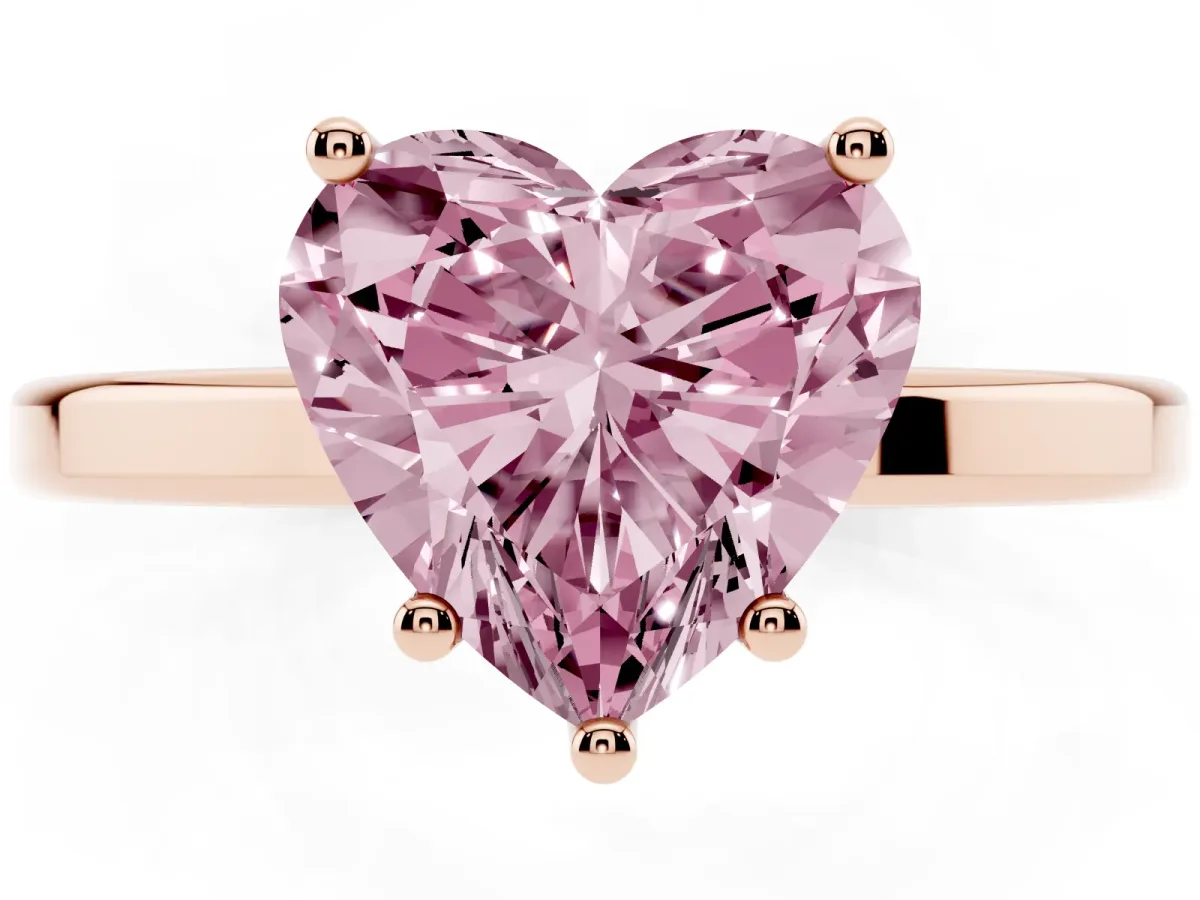 Fancy Pink Heart Cut Cut Solitaire Engagement Ring with Four-Prong Setting on a Classic Band Rose gold