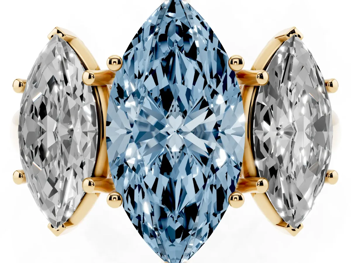 Fancy Blue Three-Stone Marquise Cut Diamond Engagement Ring with Prong Setting Yellow gold