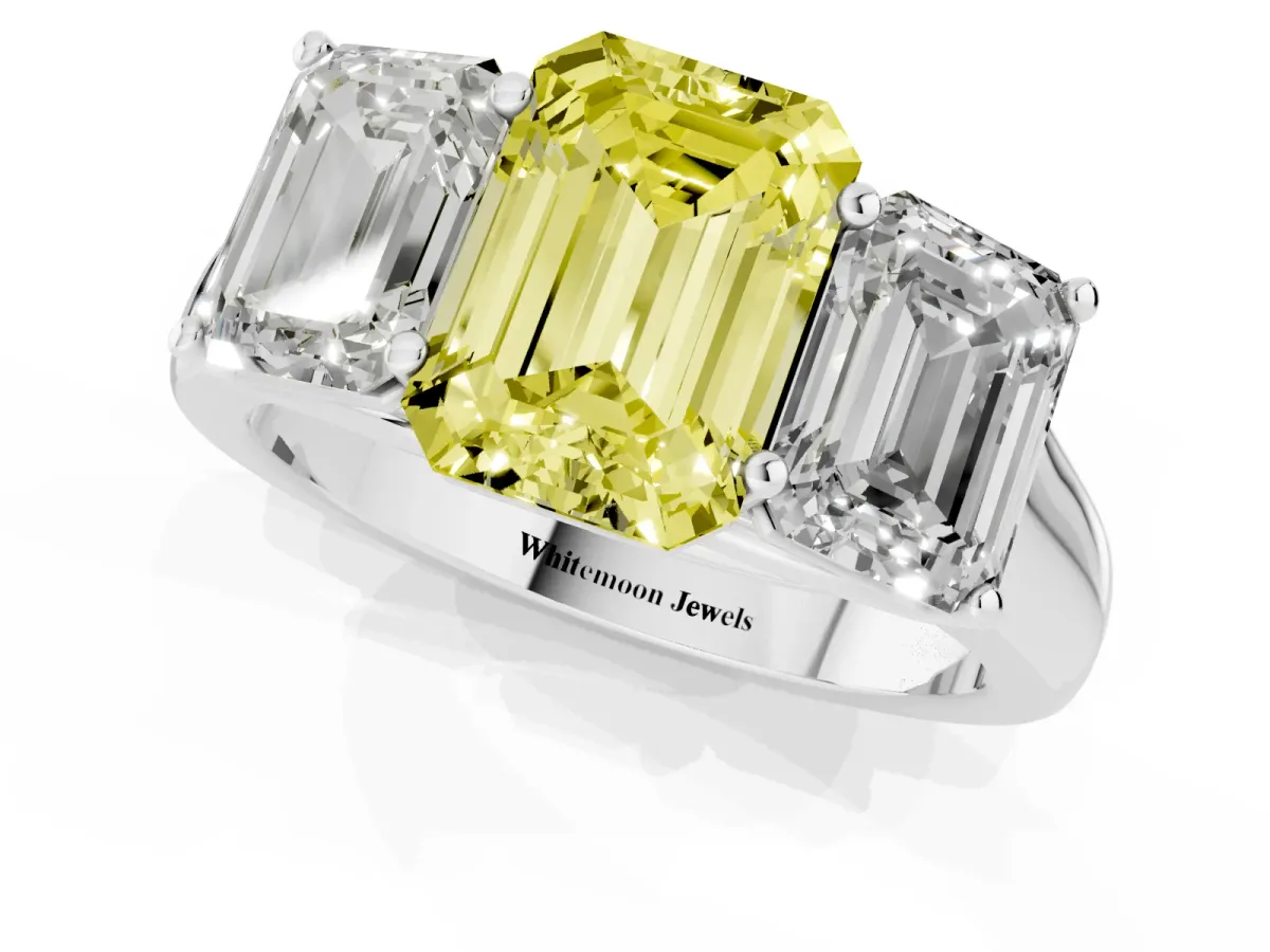 Fancy Yellow Emerald Cut Three-Stone Diamond Ring with Prong Setting on a Classic Band Silver