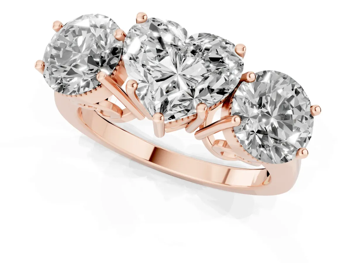 Three-Stone Heart Cut Diamond Engagement Ring with Prong Setting on a Classic Band Rose gold
