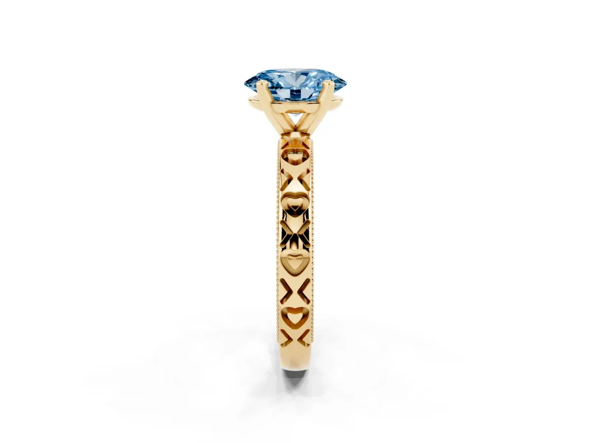 Fancy Blue Oval Cut Solitaire Diamond Engagement Ring with XO Engraved Band and Four-Prong Setting Yellow gold
